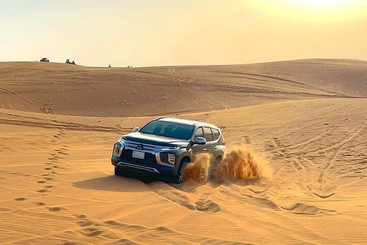 riyadh red sand dunes adventure ATV quad bikes dune bashing sand board