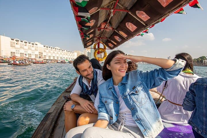 Scenic abra boat ride on Dubai Creek with views of Old Dubai.